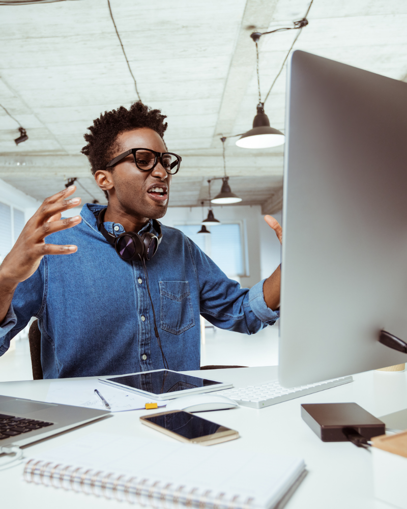 Frustrated man at computer